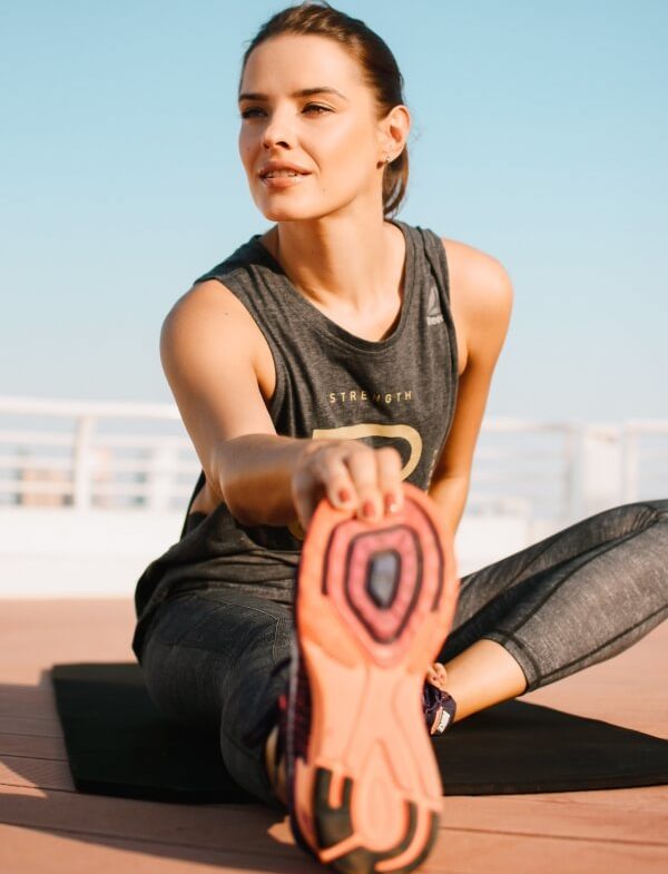 woman performing osteoporosis exercises