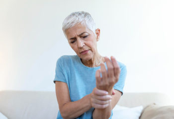 elderly woman suffering from osteoporosis